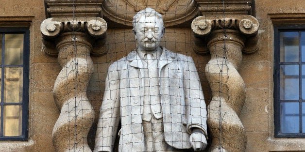 OXFORD, ENGLAND - FEBRUARY 02: A statue of Cecil Rhodes is displayed on the front of on Oriel College on February 2, 2016 in Oxford, England. Oriel College has decided to keep its statue of Cecil Rhodes despite the Rhodes Must Fall campaign. (Photo by Carl Court/Getty Images)