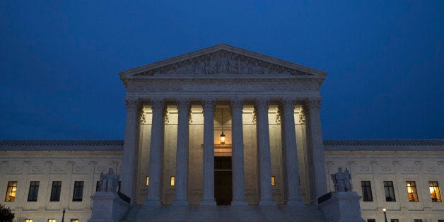 WASHINGTON, DC - FEBRUARY 14: The U.S. Supreme Court is seen in at dusk on February 14, 2016 in Washington, DC. Supreme Court Justice Antonin Scalia was at a Texas Ranch Saturday morning when he died at the age of 79. (Photo by Drew Angerer/Getty Images)