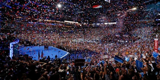 President Barack Obama and his family and Vice President Joe Biden and his family celebrate their nominations as the confetti falls at the conclusion of the Democratic National Convention in Charlotte, N.C., on Thursday, Sept. 6, 2012. (AP Photo/Carolyn Kaster)