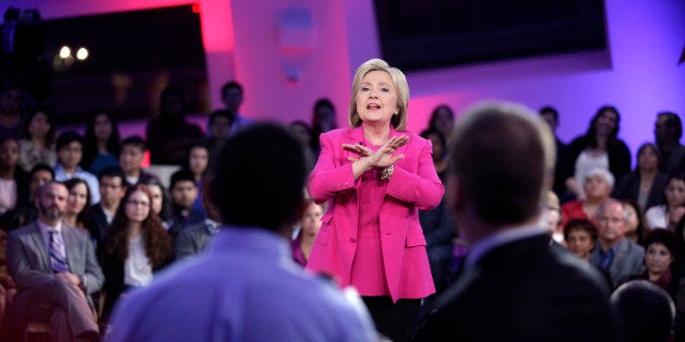 Democratic presidential candidate Hillary Clinton speaks during in a televised town hall meeting with Senator Bernie Sanders