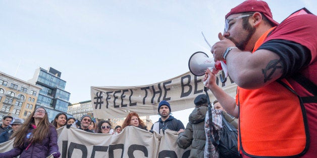 MANHATTAN, NEW YORK, NY, UNITED STATES - 2016/01/30: Demonstrators hold signs and chant in support of Bernie Sanders. Supporters of Democratic Presidential candidate Bernie Sanders rallied in Union Square Park in New York City and marched on Broadway to Zuccotti Park in lower Manhattan. (Photo by Albin Lohr-Jones/Pacific Press/LightRocket via Getty Images)