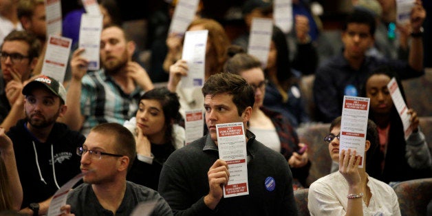 Presidential preferences cards are held up as votes are counted during a Democratic caucus at the University of Nevada Saturd