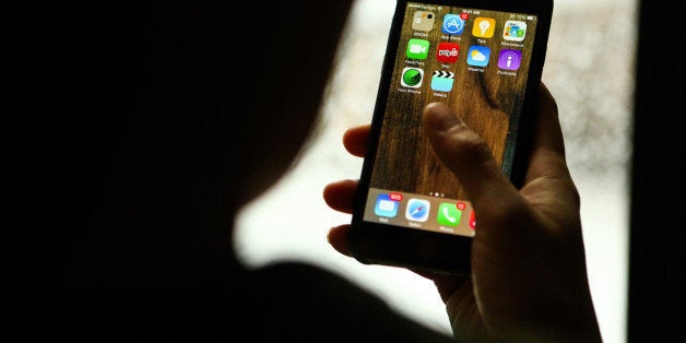 The Yelp Inc. application is displayed on an Apple Inc. iPhone in an arranged photograph taken in New York, U.S., on Friday,