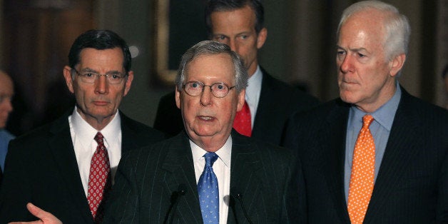 WASHINGTON, DC - FEBRUARY 23: Senate Majority Leader Mitch McConnell (R-KY)(C), speaks to the media about the recent vacancy