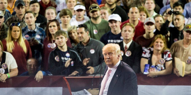 VALDOSTA, GA - FEBRUARY 29: Republican presidential candidate Donald Trump reacts to supporters during a rally at Valdosta State University February 29, 2016 in Valdosta, Georgia. On the eve of the Super Tuesday primaries, Trump is enjoying his best national polling numbers of the election cycle, increasing his lead over rivals Sens. Marco Rubio (R-FL) and Ted Cruz (R-TX). (Photo by Mark Wallheiser/Getty Images)