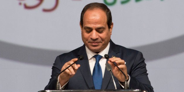 Egyptian President Abdel Fattah Al Sisi prepares to speak during the India Africa Forum Summit in New Delhi, India, Thursday,
