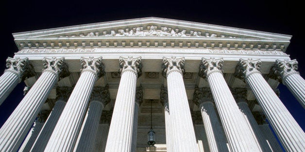 US Supreme Court building, Washington DC, USA.Courthouse, Federal Building, Architecture, Marble, Building exterior, Colonnade, Government, National Landmark, Pediment, Travel Destinations, Column, Facade, International Landmark, Neo-Classical, Supreme Court, American Culture, Carving, Law, Clear Sky, Famous Place, Western script, Ornate, White