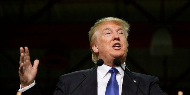 Republican presidential candidate Donald Trump speaks during a campaign rally at Clinton Middle School, Saturday, Jan. 30, 2016, in Clinton, Iowa. (AP Photo/Charlie Neibergall)