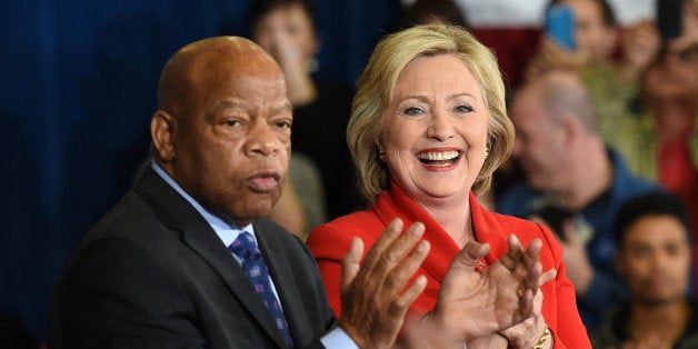 LAS VEGAS, NV - FEBRUARY 14: U.S. Rep. John Lewis (D-GA) (L) and Democratic presidential candidate Hillary Clinton are introduced at a get-out-the-caucus event at the Mountain Shadows Community Center on February 14, 2016 in Las Vegas, Nevada. Clinton is challenging Sen. Bernie Sanders for the Democratic presidential nomination ahead of Nevada's Feb. 20 Democratic caucus. (Photo by Ethan Miller/Getty Images)