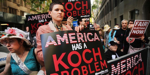 NEW YORK, NY - JUNE 05: Activists hold a protest near the Manhattan apartment of billionaire and Republican financier David Koch on June 5, 2014 in New York City. The demonstrators were protesting against the campaign contributions by the billionaire Koch brothers who are owners of Koch Industries Inc. The brothers have become a focus of Democrats and liberals as they are accused of skewing the political playing field with their finances. (Photo by Spencer Platt/Getty Images)