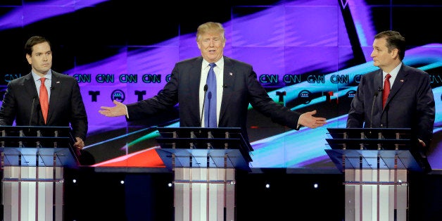 Republican presidential candidate, businessman Donald Trump, speaks as Republican presidential candidate, Sen. Marco Rubio, R-Fla., left, and Republican presidential candidate, Sen. Ted Cruz, R-Texas, right, look on during a Republican presidential primary debate at The University of Houston, Thursday, Feb. 25, 2016, in Houston. (AP Photo/David J. Phillip)