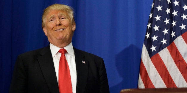 Republican presidential candidate Donald Trump smiles during a news conference before a rally in Fort Worth, Texas, Friday, F
