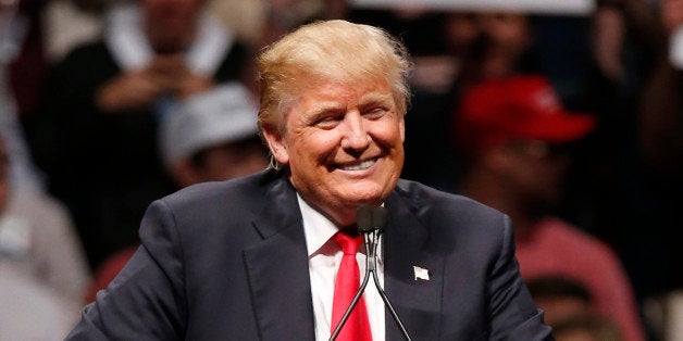 Republican presidential candidate Donald Trump speaks at a rally in Oklahoma City, Friday, Feb. 26, 2016. (AP Photo/Sue Ogrocki)