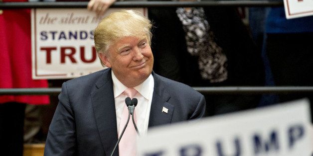 Donald Trump, president and chief executive of Trump Organization Inc. and 2016 Republican presidential candidate, smiles while arriving to speak during a campaign rally at the Radford University Dedmon Arena in Radford, Virginia, U.S., on Monday, Feb. 29, 2016. The single biggest day of voting in the Republican primary is March 1, Super Tuesday, when nearly half of the delegates needed to secure the nomination are up for grabs with Trump favored in most of these contests. Photographer: Andrew Harrer/Bloomberg via Getty Images 