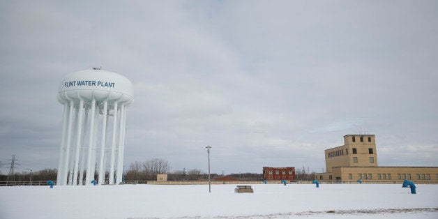 The Flint Water Plant tower is seen, Friday, Feb. 26, 2016 in Flint, Mich. Flint is under a public health emergency after its
