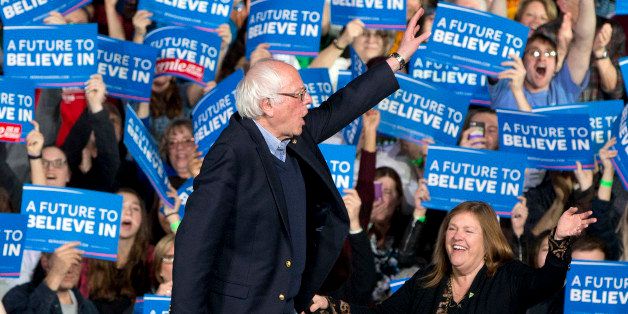 Democratic presidential candidate Sen. Bernie Sanders, I-Vt., waves with his wife Jane Sanders, as they arrive to a primary night rally in Essex Junction, Vt., Tuesday, March 1, 2016, on Super Tuesday. (AP Photo/Jacquelyn Martin)