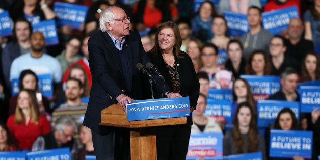 ESSEX JUNCTION, VT - MARCH 01: Democratic presidential candidate, Sen. Bernie Sanders (D-VT) speaks to supporters as his wife Jane O'Meara Sanders looks on after winning the Vermont primary on Super Tuesday on March 1, 2016 in Essex Junction, Vermont. Thirteen states and one territory are participating in today's Super Tuesday: Alabama, Alaska, Arkansas, Colorado, Georgia, Massachusetts, Minnesota, Oklahoma, Tennessee, Texas, Vermont, Virginia, Wyoming and American Samoa. (Photo by Spencer Platt/Getty Images)