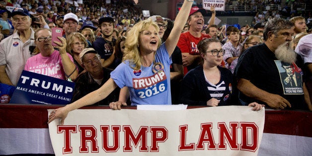 A member of the audience cheers as Republican presidential candidate Donald Trump speaks at a rally at Valdosta State University in Valdosta, Ga., Monday, Feb. 29, 2016. (AP Photo/Andrew Harnik)