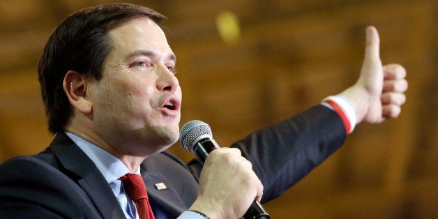 Republican presidential candidate, Sen. Marco Rubio, R-Fla., gives a thumbs-up as he talks to supporters at a campaign rally, Tuesday, March 1, 2016, in Miami. (AP Photo/Alan Diaz)