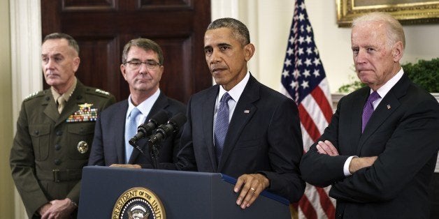 Chairman of the Joint Chiefs of Staff Marine General Joseph F. Dunford (L), US Secretary of Defense Ashton Carter (2L) and US Vice President Joe R. Biden (R) listen while US President Barack Obama makes a statement in the Roosevelt Room of the White House October 15, 2015 in Washington, DC. President Obama on Thursday announced thousands of US troops will remain in Afghanistan past 2016, retreating from a major campaign pledge and acknowledging Afghan forces are not ready to stand alone. AFP PHOTO/BRENDAN SMIALOWSKI (Photo credit should read BRENDAN SMIALOWSKI/AFP/Getty Images)