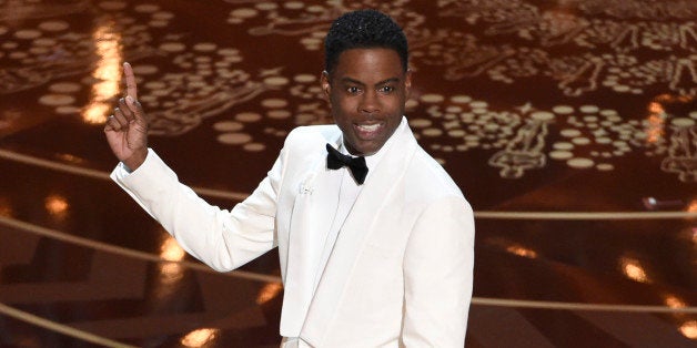 Host Chris Rock speaks at the Oscars on Sunday, Feb. 28, 2016, at the Dolby Theatre in Los Angeles. (Photo by Chris Pizzello/Invision/AP)