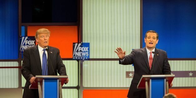 Republican Presidential candidates Ted Cruz (R) and Donald Trump spar during the Republican Presidential Debate in Detroit, Michigan, March 3, 2016. / AFP / Geoff Robins (Photo credit should read GEOFF ROBINS/AFP/Getty Images)