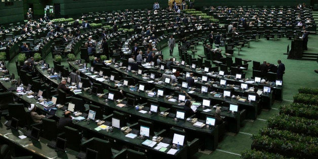 A general view shows an open session of the outgoing parliament in Tehran, Iran, Tuesday, March 1, 2016. A coalition of moderates and reformists gained bigger ground in the new parliament after Friday elections, the biggest presence of the camp over the past decade. The new parliament will take office in late May. (AP Photo/Vahid Salemi)