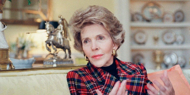 First Lady Nancy Reagan gestures during an interview with the Associated Press, on Wednesday, Jan. 14, 1989 at the White House. As Mrs. Reagan prepares to leave the pomp and pageantry of eight White House years behind her, she says she wants to be remembered for her work against drug abuse. (AP Photo/Charles Tasnadi)