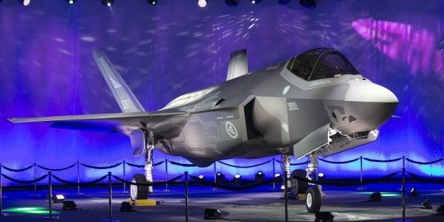 First Norwegian Armed Forces Lockheed Martin F-35A Lightning II, known as AM-1 Joint Strike Jet Fighter, is unveiled during the rollout celebration at Lockheed Martin production facility in Fort Worth, TX, on Tuesday, Sep. 22, 2015. The Lockheed Martin F-35 Lightning II is a family of single-seat, single-engine, all-weather stealth multirole fighters undergoing final development and testing by the United States. The fifth generation combat aircraft is designed to perform ground attack, aerial reconnaissance, and air defense missions. AFP PHOTO/LAURA bUCKMAN (Photo credit should read LAURA BUCKMAN/AFP/Getty Images)