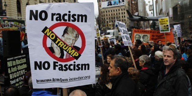 NEW YORK, NY - MARCH 13: Peace activists take part in a rally and march against Donald Trump on March 13, 2016 in New York City. The Trump campaign cancelled a recent rally in Chicago after learning hundreds of demonstrators were ticketed for the event. (Photo by Eduardo Munoz Alvarez/Getty Images)