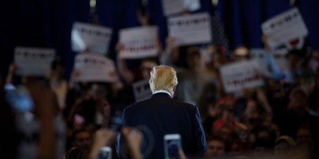 Republican Presidential hopeful Donald Trump speaks during a rally March 13, 2016 in West Chester, Ohio. / AFP / Brendan Smia