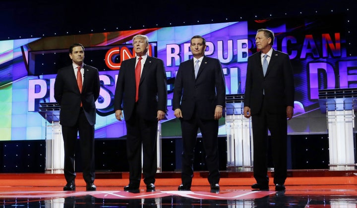 Republican presidential candidates, Sen. Marco Rubio, R-Fla., left, Donald Trump, Sen. Ted Cruz, R-Texas, and Ohio Gov. John Kasich, right, stand together before the start of the Republican presidential debate sponsored by CNN, Salem Media Group and the Washington Times at the University of Miami, Thursday, March 10, 2016, in Coral Gables, Fla. (AP Photo/Alan Diaz)