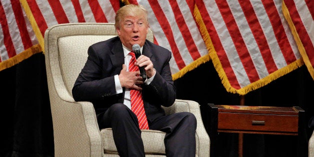 Republican presidential candidate Donald Trump gestures as he speaks at a rally at Lenoir-Rhyne University in Hickory, N.C., Monday, March 14, 2016. (AP Photo/Chuck Burton)