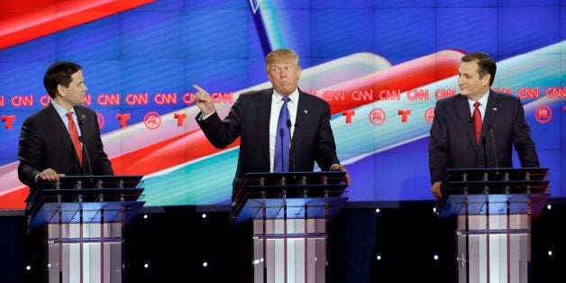 Republican presidential candidate, businessman Donald Trump, center, speaks as Republican presidential candidate, Sen. Marco Rubio, R-Fla., left, and Republican presidential candidate, Sen. Ted Cruz, R-Texas, right, look on during a Republican presidential primary debate at The University of Houston, Thursday, Feb. 25, 2016, in Houston. (AP Photo/David J. Phillip)