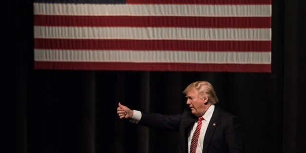 HICKORY, NC - MARCH 14: Republican presidential candidate Donald Trump exits the stage during a campaign rally at Lenoir-Rhyne University March 14, 2016 in Hickory, North Carolina. The North Carolina Republican primary will be held March 15. (Photo by Sean Rayford/Getty Images)