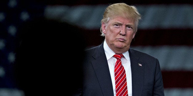 Donald Trump, president and chief executive of Trump Organization Inc. and 2016 Republican presidential candidate, listens to a question during a town hall event at the Tampa Convention Center in Tampa, Florida, U.S., on Monday, March 14, 2016. As protesters shadow campaign appearances by Trump, the billionaire has shifted a planned Monday-night rally in south Florida to Ohio, where polls show Governor John Kasich may be pulling ahead days before the states primary election. Photographer: Andrew Harrer/Bloomberg via Getty Images 