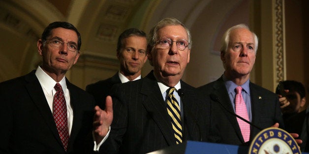 WASHINGTON, DC - MARCH 08: U.S. Senate Majority Leader Sen. Mitch McConnell (R-KY) (3rd L) speaks as (L-R) Sen. John Barrass