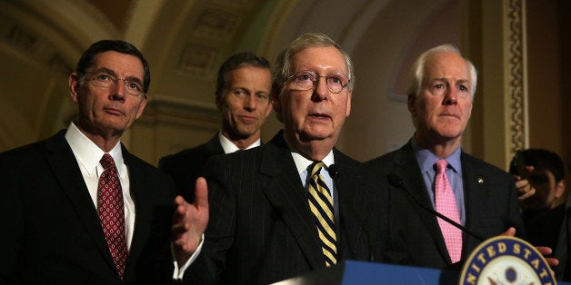 WASHINGTON, DC - MARCH 08: U.S. Senate Majority Leader Sen. Mitch McConnell (R-KY) (3rd L) speaks as (L-R) Sen. John Barrasso (R-WY), Sen. John Thune (R-SD), and Senate Majority Whip Sen. John Cornyn (R-TX) listen during a news briefing after the weekly Republican policy luncheon March 8, 2016 on Capitol Hill in Washington, DC. Senate Republicans held the weekly luncheon to discuss GOP agenda. (Photo by Alex Wong/Getty Images)