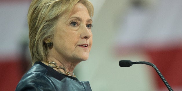 Democratic Presidential candidate Hillary Clinton speaks to supporters at a rally at the Nelson-Mulligan Carpenters' Training Center on March 12, 2016 in St. Louis, Missouri.Democratic frontrunner Hillary Clinton issued a stern warning to Trump after tensions boiled over in Chicago, just days before a crucial new round of presidential nomination votes on Tuesday. / AFP / Michael B. Thomas (Photo credit should read MICHAEL B. THOMAS/AFP/Getty Images)