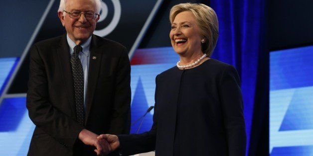 Democratic presidential candidates, Hillary Clinton and Sen. Bernie Sanders, I-Vt, shakes hands before the start of the Univision, Washington Post Democratic presidential debate at Miami-Dade College, Wednesday, March 9, 2016, in Miami, Fla. (AP Photo/Wilfredo Lee)
