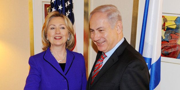 US Secretary of State Hillary Rodham Clinton (L) shakes hands with Israel's Prime Minister Benjamin Natanyahu before their meeting November 11, 2010 in New York. US Secretary of State Hillary Clinton vowed to find a 'way forward' on the stalled Middle East peace process as she began a crunch meeting Thursday with Israeli Prime Minister Benjamin Netanyahu. AFP PHOTO/Stan Honda (Photo credit should read STAN HONDA/AFP/Getty Images)