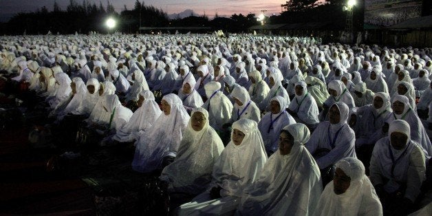 ACEH, INDONESIA-FEBRUARY 28: People pray for the world peace in front of Aceh police office yard in Banda Aceh, Indonesia on February 28, 2016. Thousands of Indonesian Muslims has been prayed for no more groups that perpetrate acts of terror in the so-called name of Islam both in Indonesia and around the world. (Photo by Junaidi Hanafiah/Anadolu Agency/Getty Images)