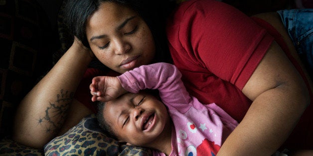 FLINT, MI - MARCH 1: Nakeyja Cade with her one-year-old daughter Zariyah Cade whose blood has tested high for lead in Flin