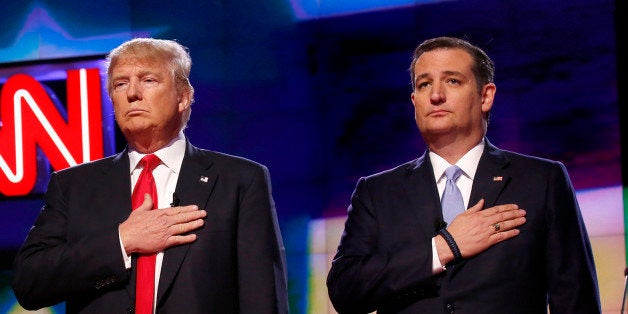 MIAMI, FLORIDA - MARCH 10, 2016: The four remaining Republican primary candidates Marco Rubio, Donald Trump, Ted Cruz, and John Kasich (not shown) listen to the National Anthem at the beginning of the debate at the University of Miami on March 10, 2016, hosted by CNN and the Washington Times. (Photo by Carolyn Cole/Los Angeles Times via Getty Images)