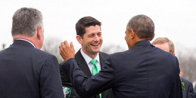 President Barack Obama, center, shares a laugh with House Speaker Paul Ryan of Wis., after walking down the steps of the Capi