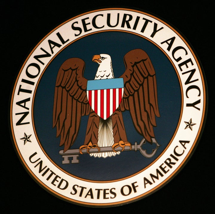 Fort Meade, UNITED STATES: The logo of the National Security Agency (NSA) hangs at the Threat Operations Center inside the N