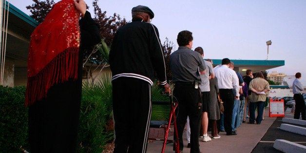 PHOENIX - NOVEMBER 4: People line up to vote at the Albright United Methodist Church November 4, 2008 in Phoenix, Arizona. Voting is underway in the U.S. presidential elections with Democratic presidential nominee Sen. Barack Obama (D-IL) leading in the polls against the Republican presidential nominee Sen. John McCain (R-AZ). (Photo by Mark Wilson/Getty Images)