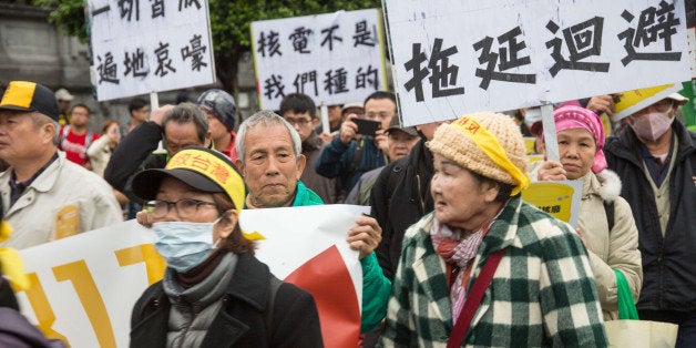 KETAGALAN BLVD, TAIPEI, TAIWAN - 2016/03/12: Resdients of Lanyu, an island off the coast of Taiwan where radioactive waste is stored, march at a mass protest against nuclear power. Activists and civic groups took to the streets for an annual anti-nuclear rally. Held to coincide with the anniversary of the Fukushima nuclear disaster, they are calling for Taiwan to become nuclear free. Taiwan currently has three operational nuclear plants, and one that has yet to enter service. (Photo by Craig Ferguson/LightRocket via Getty Images)