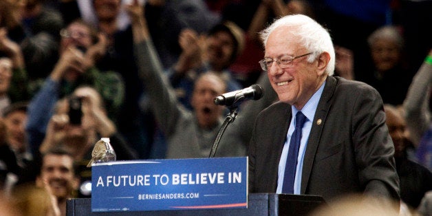 PORTLAND, OR - MARCH 25: A bird lands on Democratic presidential candidate Bernie Sanders podium as he speaks on March 25, 2016 in Portland, Oregon. Sanders spoke to a crowd of more than eleven thousand about a wide range of issues, including getting big money out of politics, his plan to make public colleges and universities tuition-free, combating climate change and ensuring universal health care. (Photo by Natalie Behring/Getty Images)