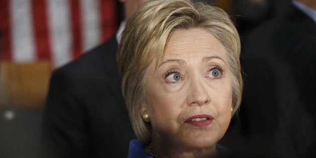 Hillary Clinton, former Secretary of State and 2016 Democratic presidential candidate, speaks with an attendees after a round table discussion at the University of Southern California (USC) in Los Angeles, California, U.S., on Thursday, March 24, 2016. More than halfway through a nomination race that she entered as the clear favorite, Clinton finds herself deadlocked with Bernie Sanders among Democrats. Photographer: Patrick T. Fallon/Bloomberg via Getty Images